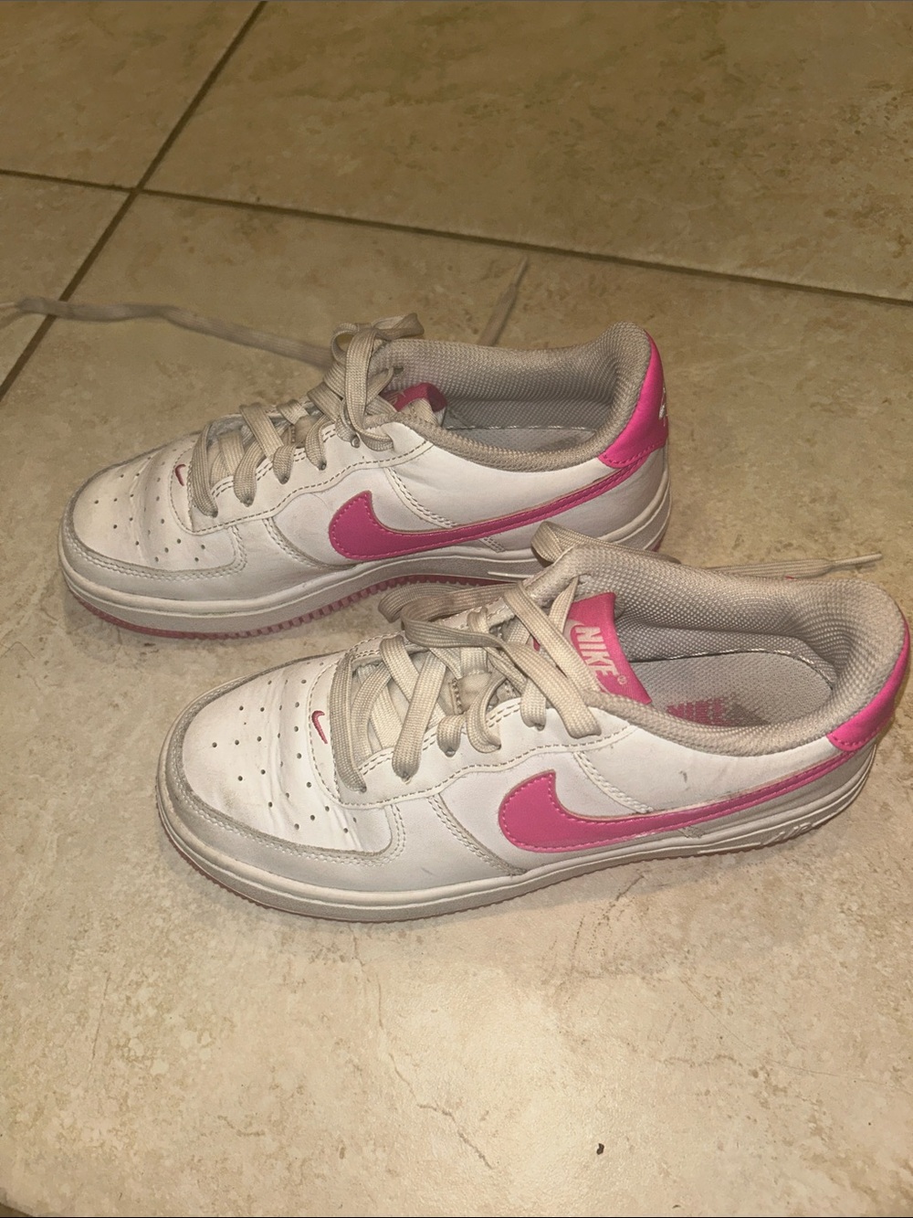 Nike Kids White Sneakers with Pink Swoosh